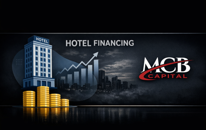 Hotel financing banner with a blue hotel atop gold coins, rising bar chart, and a cityscape in the background; MC Capital logo on the right.